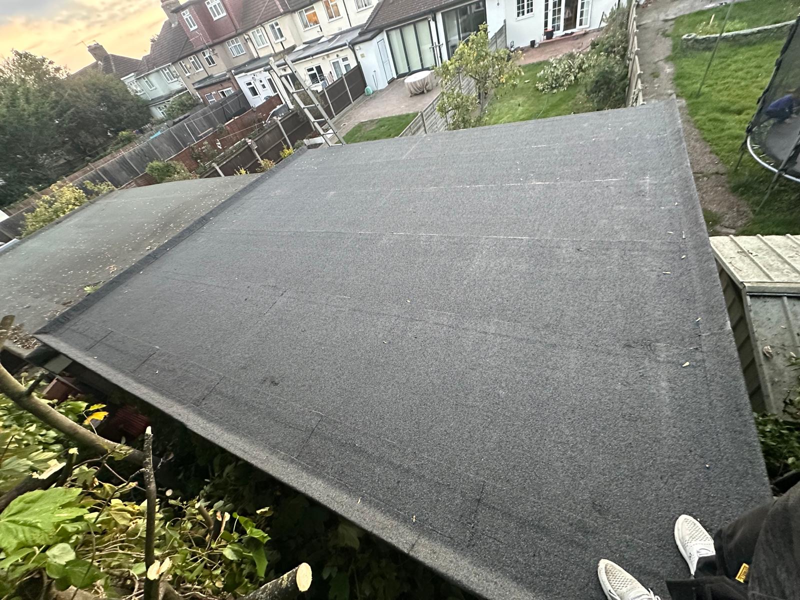 House roof construction with tiles and skylights